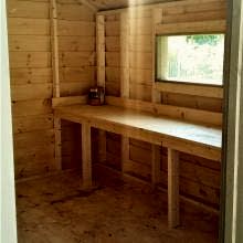 10 x 10 medium classic with a work bench.