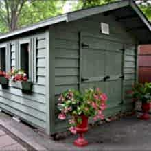 10 x 10 high classic with a 2 foot gable overhang and double doors.